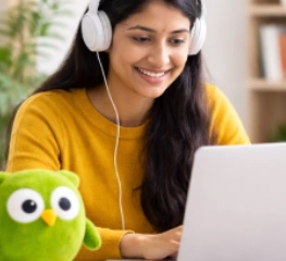 Student preparing for Duolingo English Test on laptop - RCEC